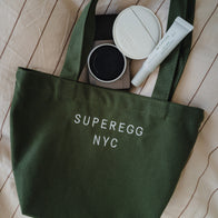 Load image into Gallery viewer, Olive green tote bag with embroidered logo SUPEREGG NYC.