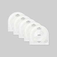 Load image into Gallery viewer, A studio shot showing a 5-pack of the Calm Movements Eye &amp; Cheek Mask sachets fanned out against a light grey background. These minimalist white sachets contain hydrogel masks designed to provide intensive hydration and soothing care for both the eye and cheek areas.