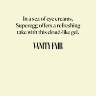 Load image into Gallery viewer, A graphic featuring a press quote from Vanity Fair for the Phyto Bounce Eye Contour Solution. The text reads: "In a sea of eye creams, Superegg offers a refreshing take with this cloud-like gel," highlighting the product's unique texture and standout performance in the market.