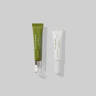 Load image into Gallery viewer, A studio shot of the Superegg Phyto Bounce Eye Contour Solution in a green tube and the ∞(Infinite) Layers Lip Care in a white tube, both displaying the Superegg logo against a clean grey background.