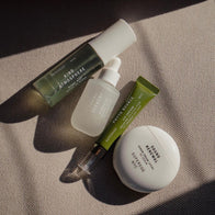 Load image into Gallery viewer, An aesthetic lifestyle flat lay of the Superegg collection, featuring Phyto Bounce Eye Contour Solution, Kind Atmosphere Biome Mist, Tonal Scenery Reparative Serum, and Sound Renewal Serum Cream. The products are arranged with soft morning shadows on a textured neutral surface.