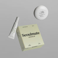 Load image into Gallery viewer, The Seoulmate Hand &amp; Lip Set featuring the egg-shaped This Moment Hand Care and the Infinite Layers Lip Care tube, floating above their minimalist pale yellow packaging box.