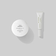 Load image into Gallery viewer, A top-down view of the Seoulmate Hand &amp; Lip Set essentials: the round white This Moment Hand Care and the sleek Infinite Layers Lip Care tube, highlighting their clean and minimalist design.