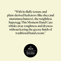 Load image into Gallery viewer, A graphic featuring an Allure press quote for This Moment Hand Care. The text describes the product as a weightless hand cream with a fluffy texture and plant-derived hydrators like shea and murumuru butters that whisk away dryness without a greasy finish. Includes the 2023 Allure Best of Beauty Award Winner badge.